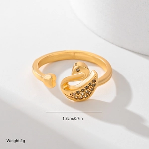 Close-up of gold leaf-shaped ring with swan design, zircons, and size 1.8cm weight 2g