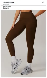 Detail view of birch tea brown high-waisted yoga pants with functional side pockets