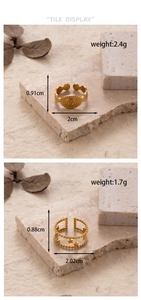 Detailed size chart for gold sun cross and evil eye steel rings with precise dimensions