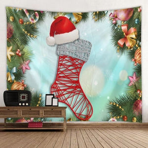 Detail of Christmas tapestry featuring festive pine branches and red santa hat on wall