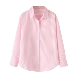 Detail of pink and white striped poplin shirt with long sleeves and sharp collar texture