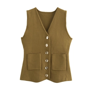 Detail of V-neck knitted vest with single-breasted metal buttons and two front pockets