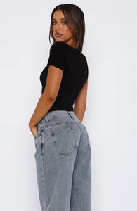 Slim fit black short sleeve T-shirt with ruched side details viewed from the back-side angle
