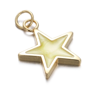 Detail of star-shaped gold pendant with marble texture inlay for jewelry making