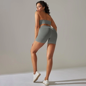 Detail of sage green seamless yoga set featuring ribbed texture and high-waist fit