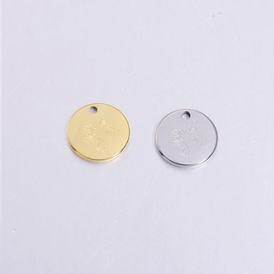 Polished gold and silver stainless steel flower pendants with engraved birthday floral designs