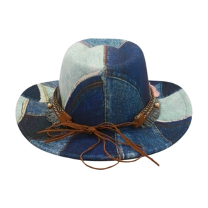 Detail of patchwork denim jazz hat featuring ethnic braid, grey fringe and wood beads