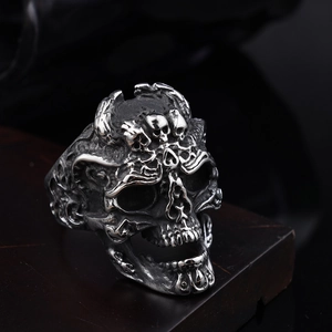 Gothic skull stack ring in oxidized stainless steel with vintage punk rock aesthetic
