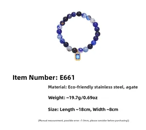 Detail view of blue agate beaded bracelet with gold rectangular gemstone charm and specs