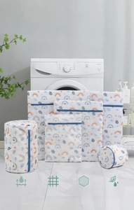 Close-up of fine mesh laundry bags with colorful rainbow prints and durable zippers