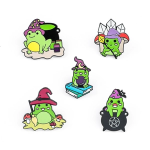 Five-piece set of cartoon green magic frog enamel pins with wizard hats and crystal balls