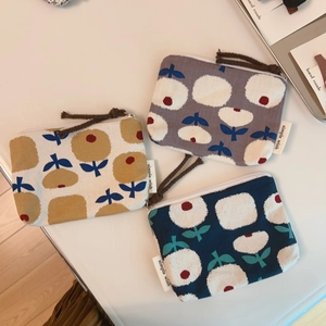 Three-piece floral cotton linen coin purses in beige, blue, and navy with simple wish labels
