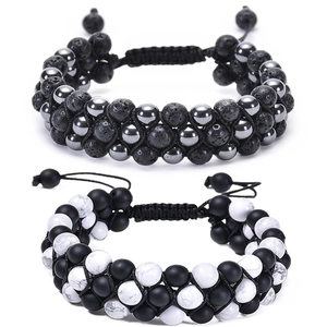 Detail of adjustable double-layer beaded bracelets with lava stone and marble beads
