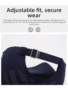 Detail of navy quick-dry cap showing laser-cut vents and adjustable silver metal buckle