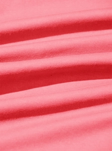 Macro shot of breathable pink cotton knit fabric texture on a casual summer t-shirt