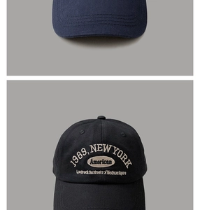 Detail of 1989 New York embroidery and stitching on a navy cotton baseball cap