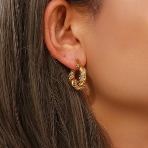 Chic 18K gold plated twisted hoop earrings with zircon stones on female model