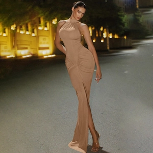 Detailed close-up of brown sleeveless halter dress with waist ruching and back zipper