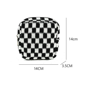 Close-up showing dimensions of 14x14x3.5cm for checkerboard knit cosmetic bag