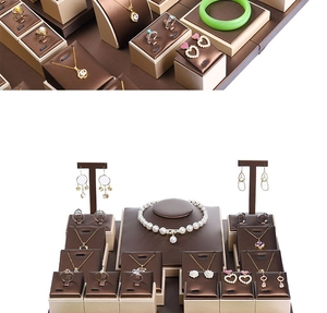 Detailed macro view and panoramic layout of the coffee brown leather jewelry display stand