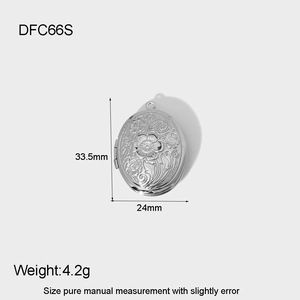 Detail showing 33.5mm oval silver locket with floral engraving and size measurements