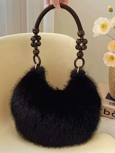 Faux fur black handbag with beaded handle and elegant fluffy texture for daily use
