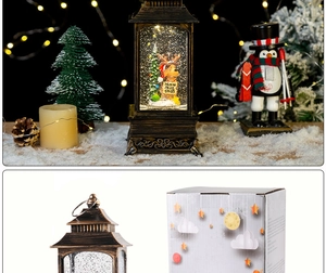 Lanterne boule à neige de Noël en bronze avec renne et paillettes de neige tourbillonnantes