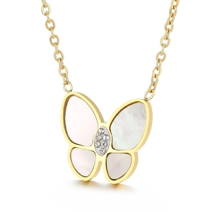 Golden necklace featuring a white shell butterfly pendant with sparkling crystal accents