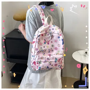 Zaino scolastico rosa con stampe di farfalle colorate e grande tasca frontale con zip