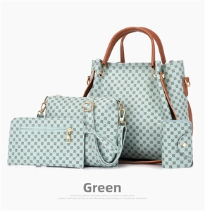 Detail of 4-piece green tote bag set including crossbody and clutch with geometric patterns