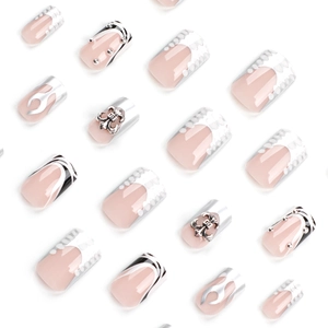 Square nude press-on nails with silver metallic flame and gothic cross decorations