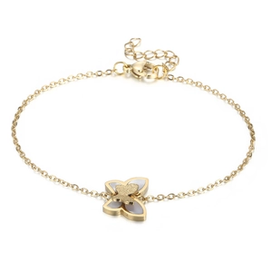 Elegante bracciale a farfalla dorato con inserto in conchiglia bianca e catena O