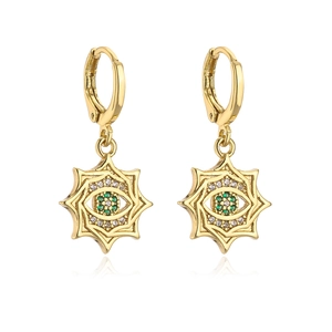 Detail of 18K gold plated evil eye earrings with star pendant and green crystals