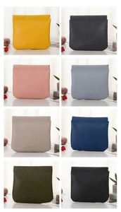 Selection of eight colorful PU leather mini storage bags for lipsticks and small items