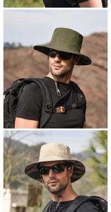 Detail of outdoor sun hats with camouflage underbrim and mountain logo embroidery