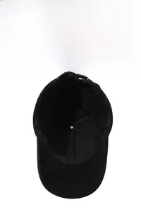 Detailed inner view of black winter baseball cap featuring warm ear flaps and thick lining
