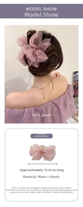 Detail view showing a 12.8cm lavender mesh bow hair claw clip on model and white background