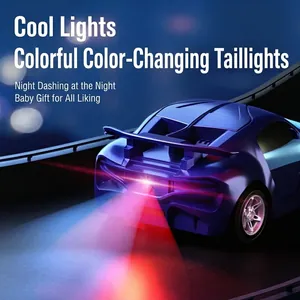 Blue remote control racing car with colorful LED lights on a high-speed night track