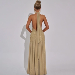 Detailed back view of champagne sequin halter neck backless slit evening gown