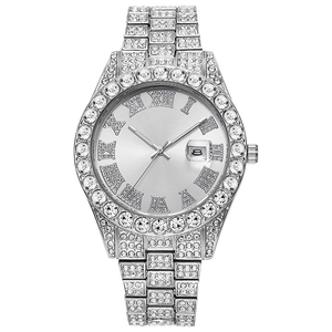 Macro shot of silver hip hop watch with Roman numerals and full crystal diamond inlay
