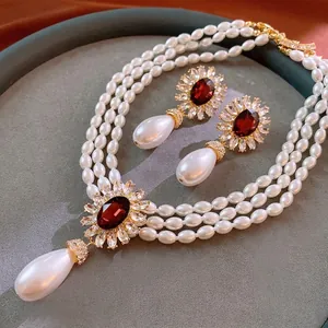 Parure de bijoux en perles de luxe avec pendentif rubis et boucles d'oreilles