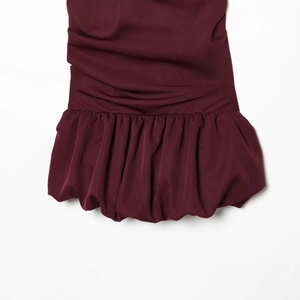 Deep red balloon hem mini dress featuring intricate pleated details and ruffled texture