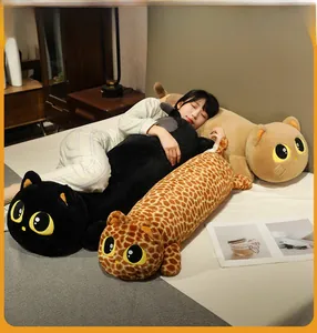 Plush long cat pillows in black and leopard print used as supportive body cushions