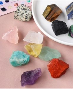Close-up of assorted natural raw crystals including amethyst and citrine for healing