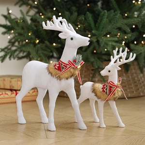 White Christmas reindeer figurine set with Nordic scarves and bells for holiday decor