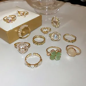 Elegant 11-piece set of cat eye stone and pearl heart gold rings for women