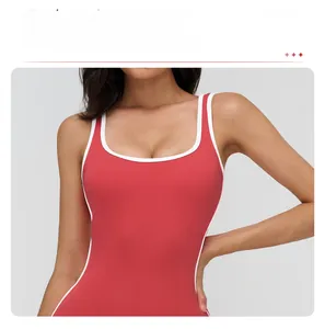 Detail view of square neck yoga bodysuit with contrast white trim and red elastic fabric