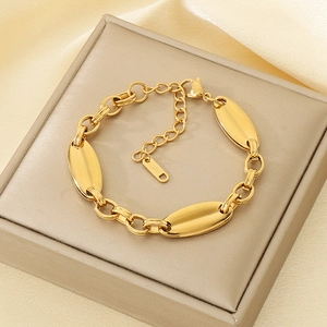 Detailed close-up of 18K gold plated stainless steel tulip moon bracelet with lobster clasp
