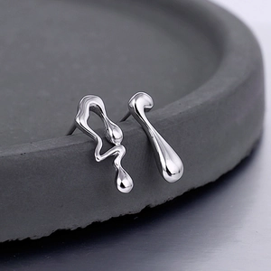 Asymmetric S925 sterling silver stud earrings featuring lava wave and teardrop shapes
