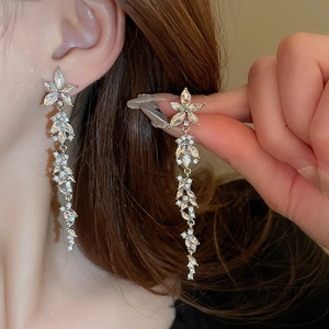 Elegant silver tassel earrings with crystal flower petals and long drop rhinestone fringe